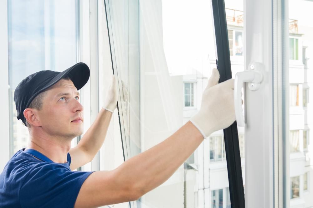 Licensed glazier repairing a broken residential window — Headlands Glass in Ballina, NSW