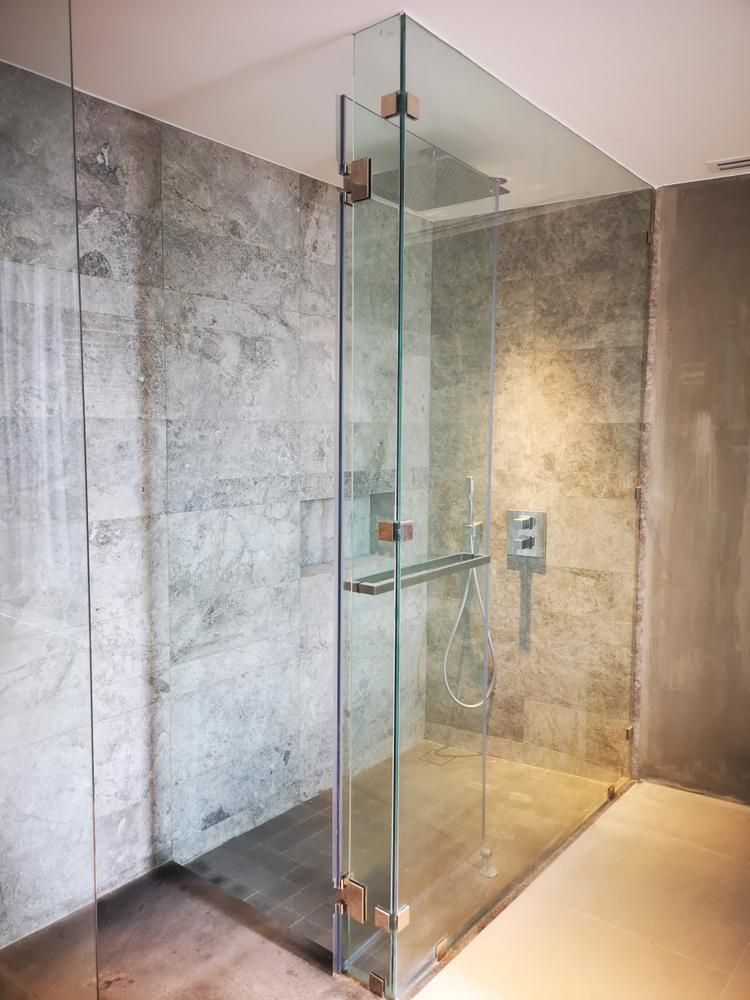 A Bathroom With a Walk in Shower With a Glass Door — Headlands Glass in Ballina, NSW