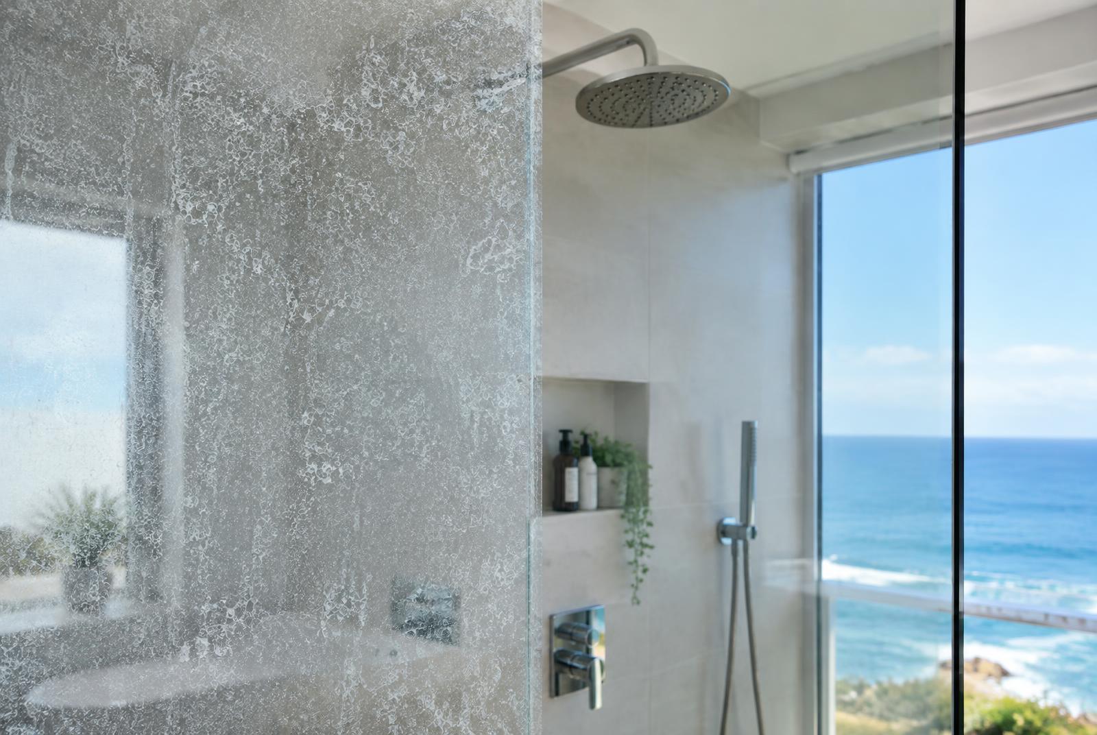 Shower screen with hard water stains and glass cancer in a coastal Ballina bathroom